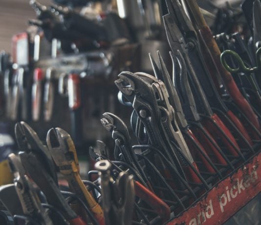 selective focus photography of mechanics tool lot