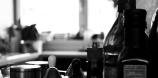 black and white photograph of a kitchen counter